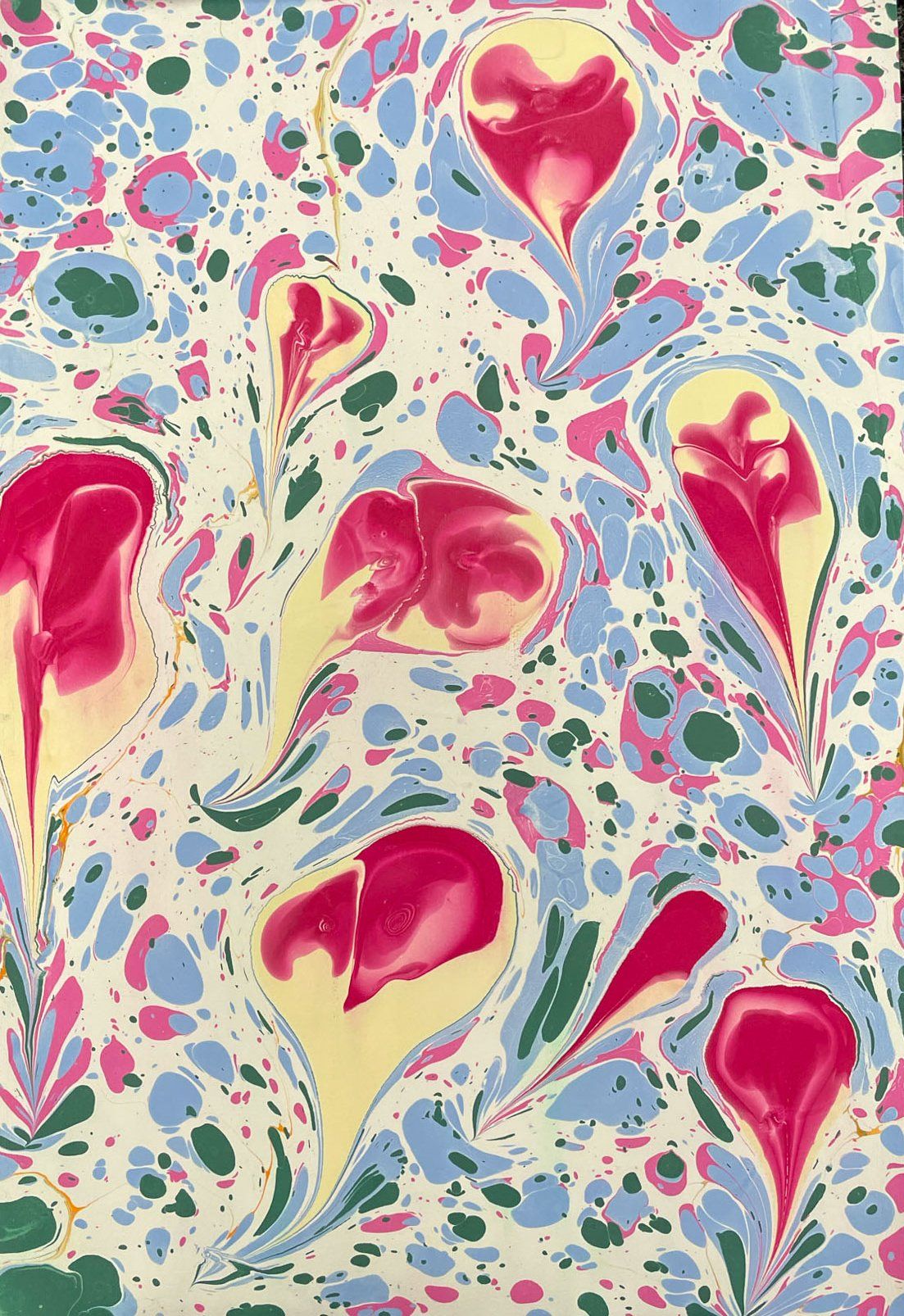 Floral motif in marbled paper with pink and blue.