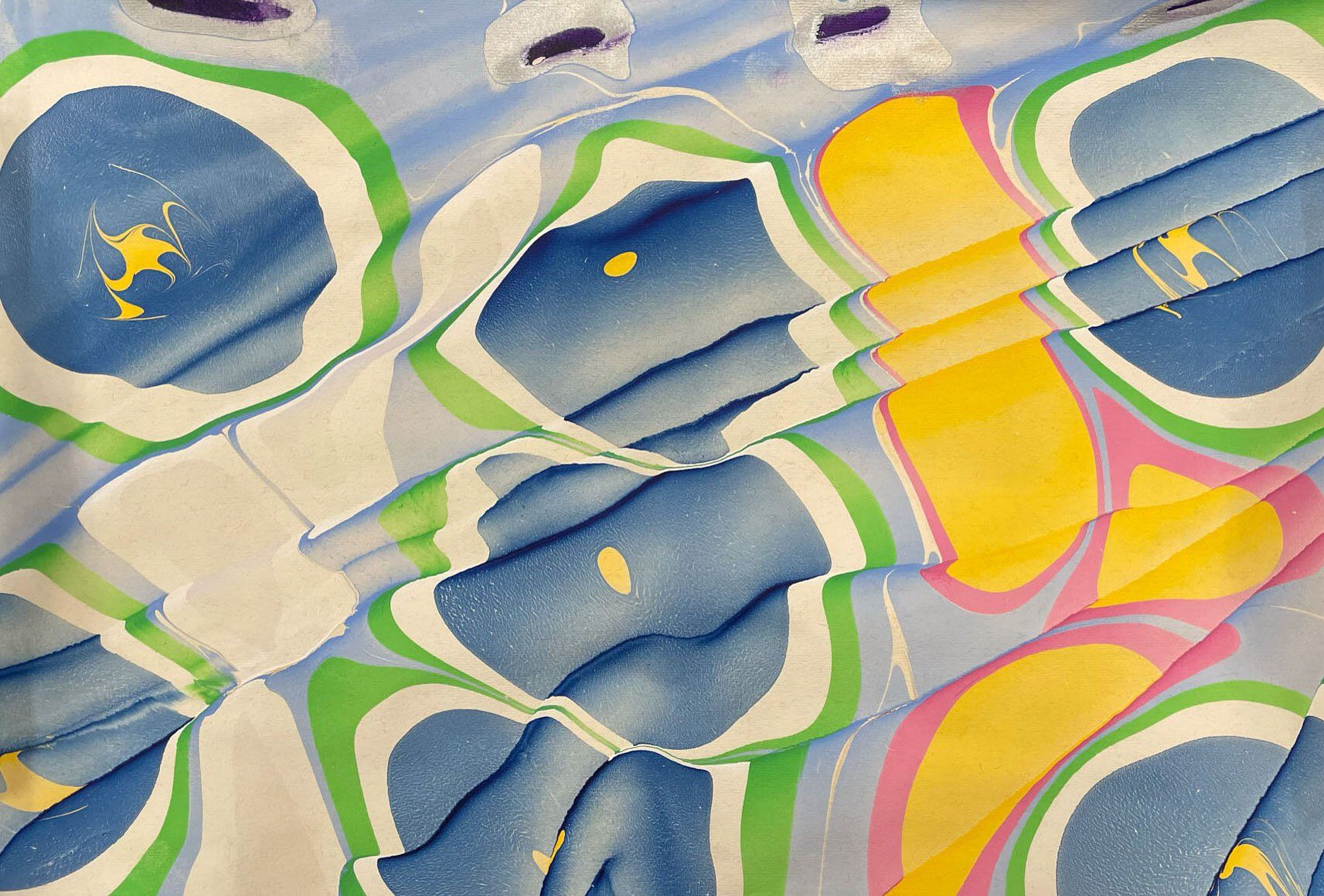 Spanish technique in marbled paper in blue, green, and yellow.