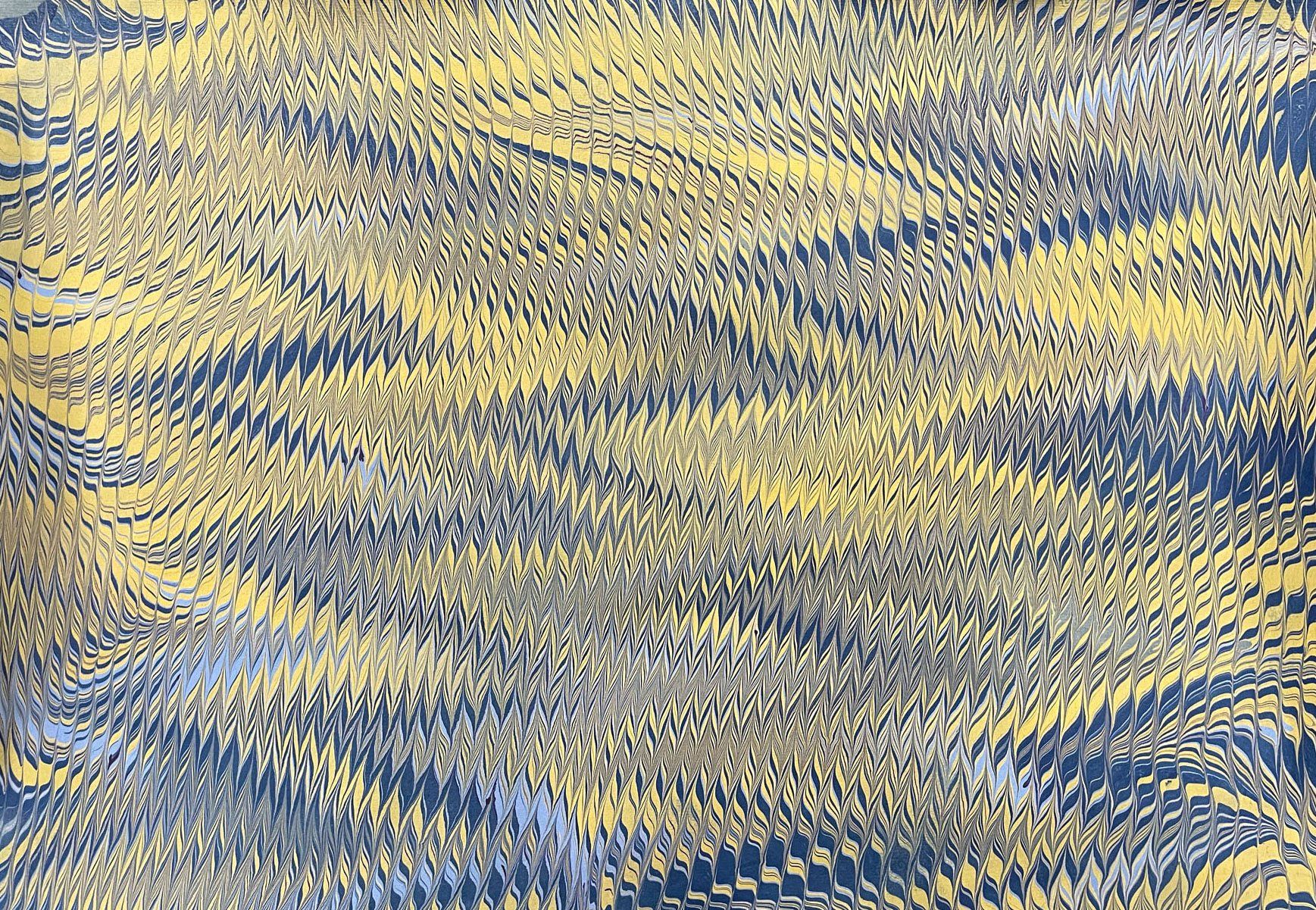 Very tight combwork in cascade pattern with yellow and blue.