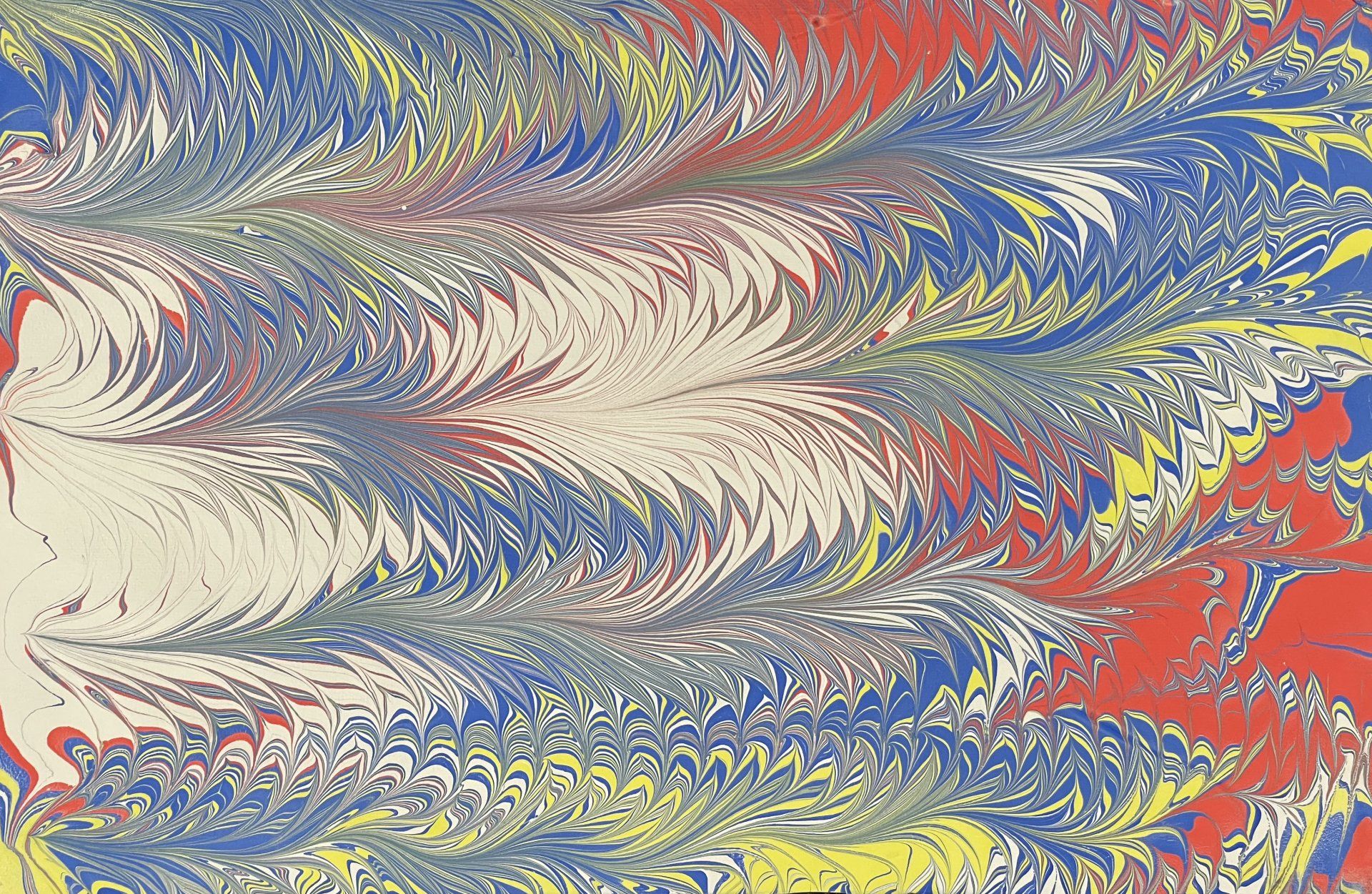 Blue and red in a palm-designed marbled artwork.