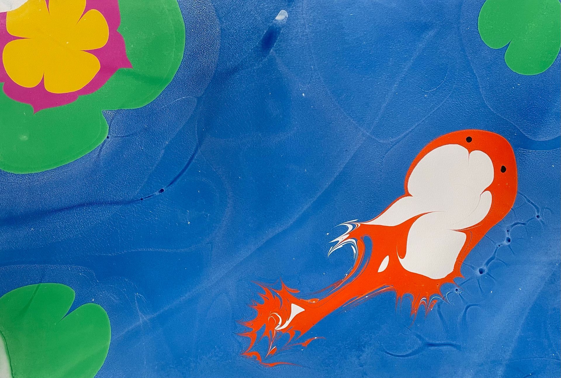 Abstract Koi Fish in pond in a marbled artwork.