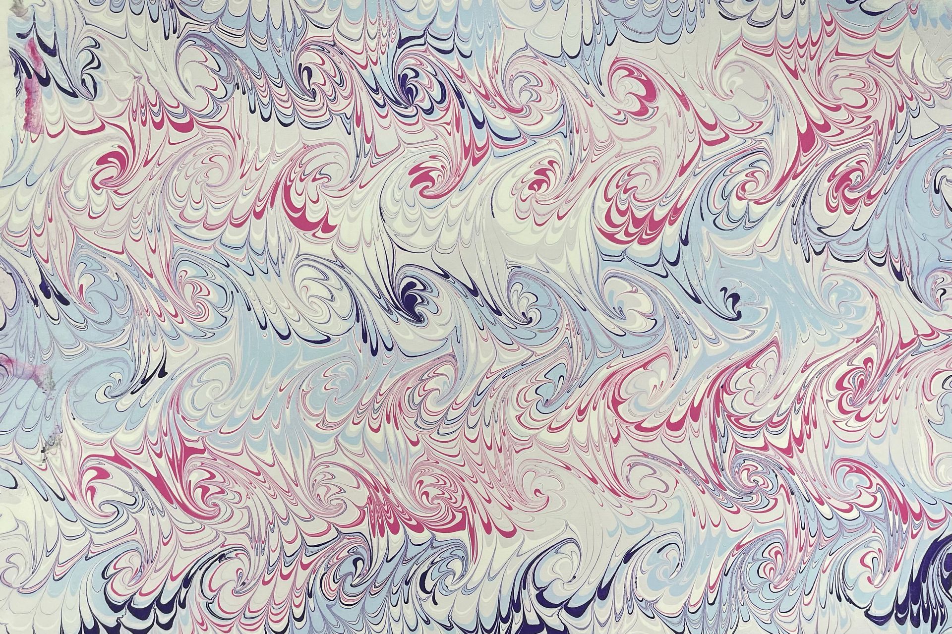 Fine snail designs in a marbled artwork of pinks and blues.