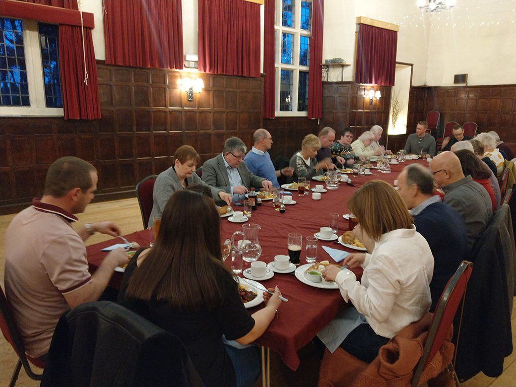 Members of the Lodge and their partners enjoy a delicious supper of fish and chips
