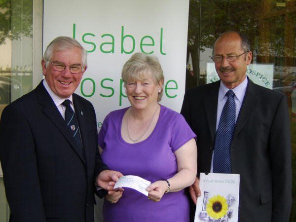 W Bros Ron Barlow and Michael Dennis present a cheque to Phillipa Grainger
