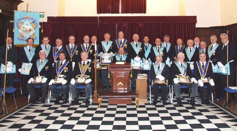 Outgoing Worshipful Master Michael Dennis, with the members of the East Hertfordshire Lodge