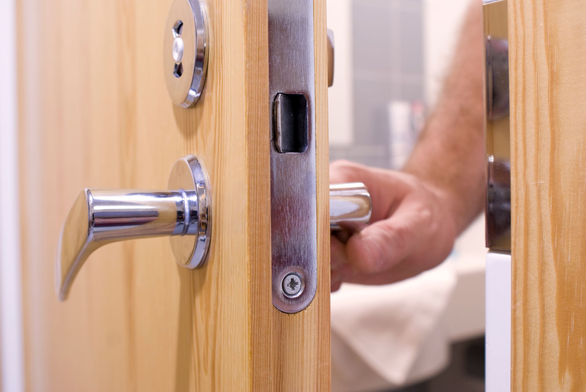 Person is Opening a Door - Miramar, Florida - A Better Keyway Locksmith