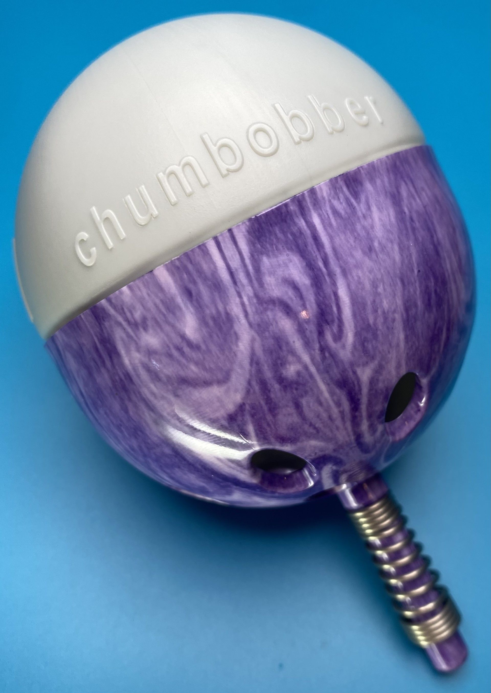 A purple and white item that says chumbobby on it