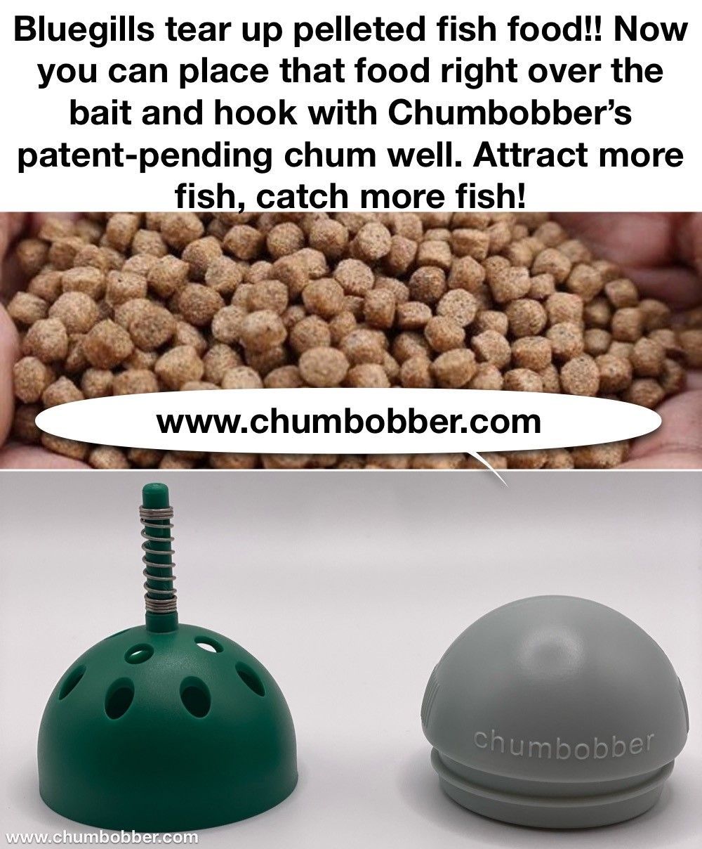 A person is holding a pile of pelleted fish food