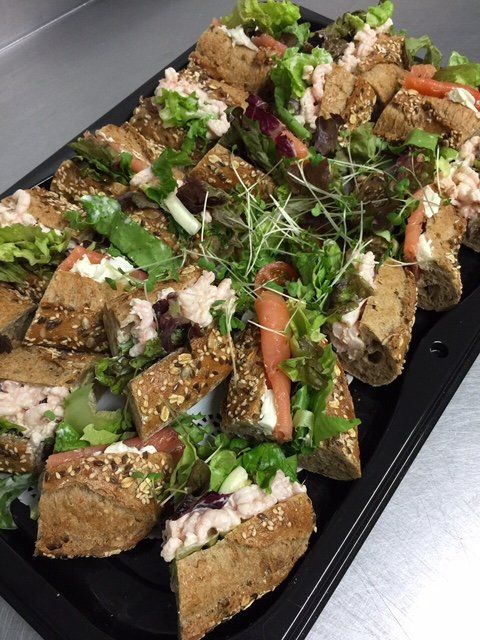 Plates full of sandwiches