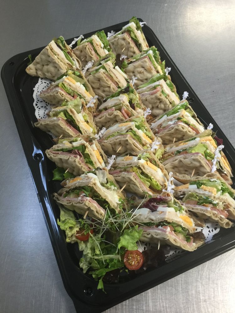 Platter full of sandwiches