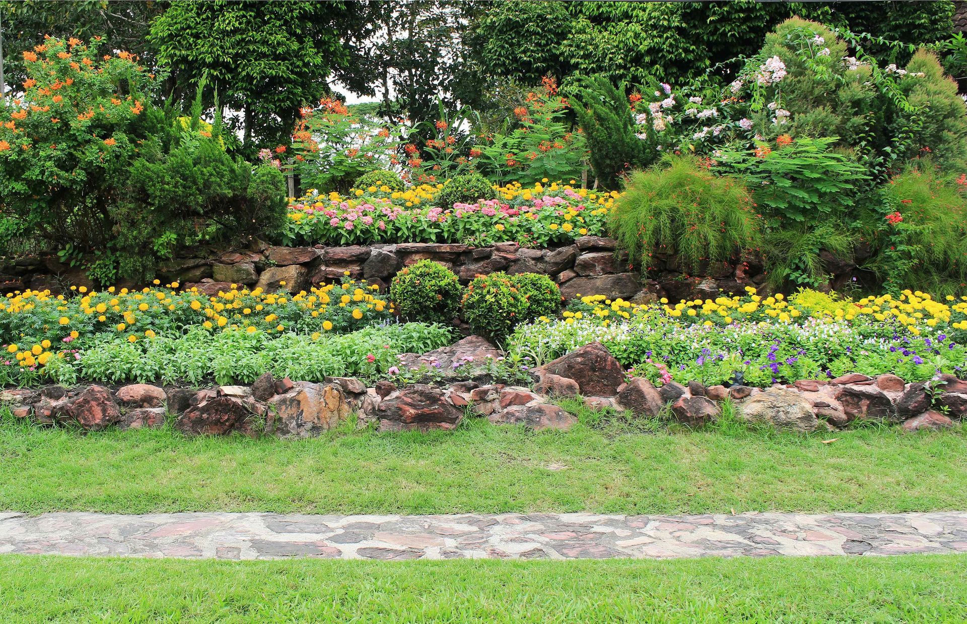 flower garden surrounded by retaining wall design