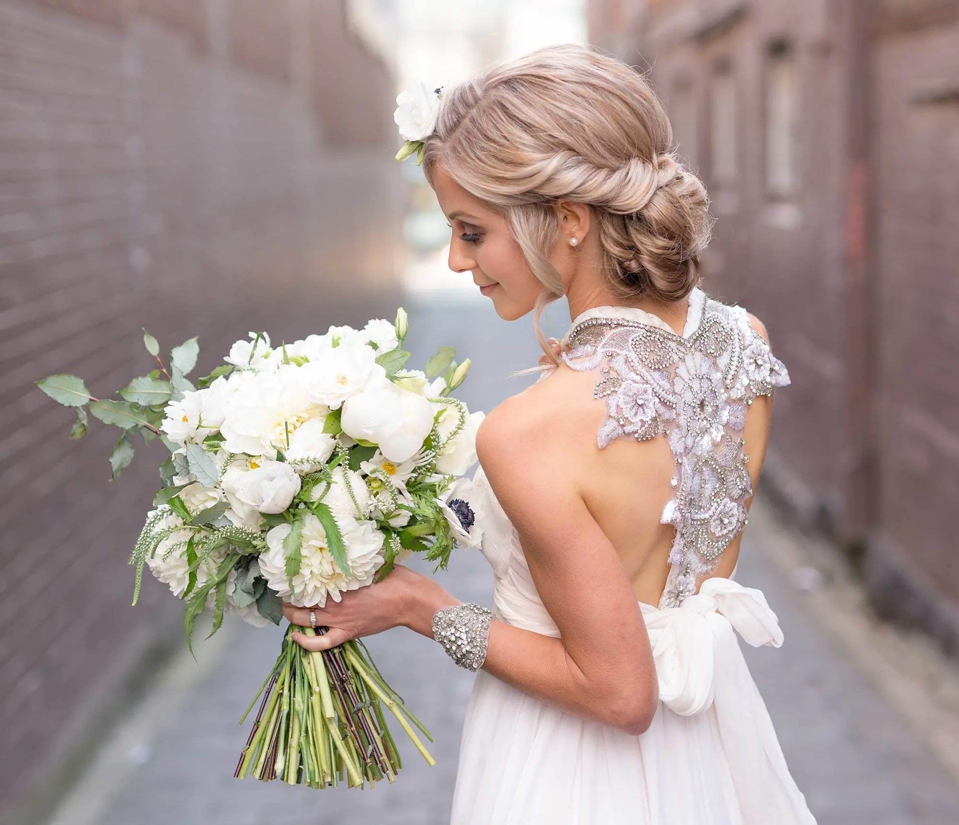 bride holding flowers
