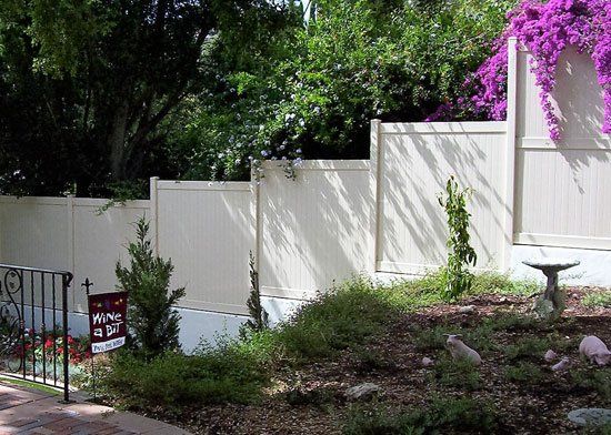 White backyard fencing — Riverside, CA — Ross Fence Co