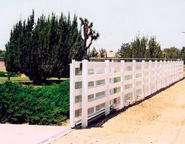 Vinyl driveway gate — Riverside, CA — Ross Fence Co