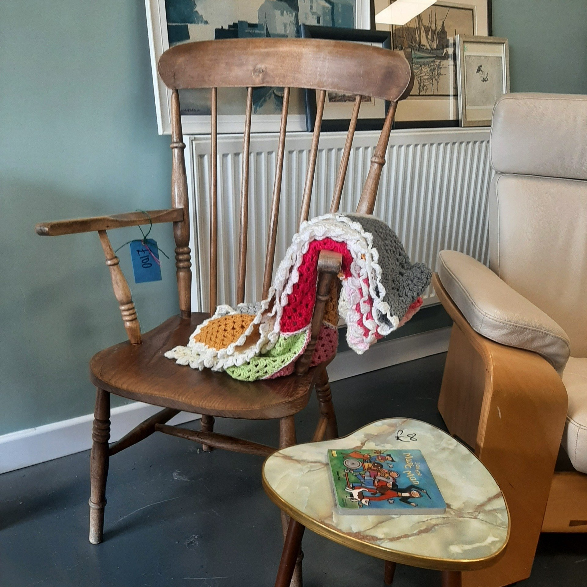 An image of a carver chair and vintage items