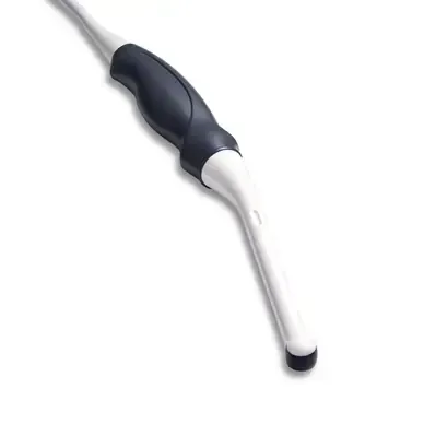 A close up of a medical device with a black handle on a white background.