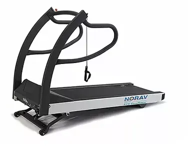 A treadmill is sitting on a white surface.