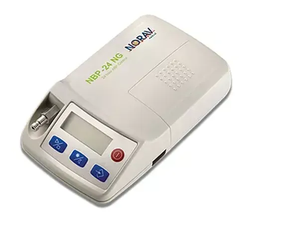 A noram device is sitting on a white surface