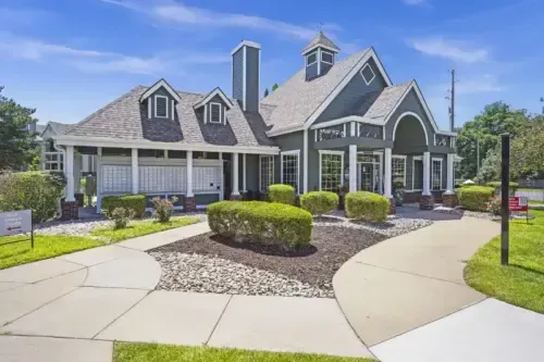 Exterior view of the property office with landscaped yard