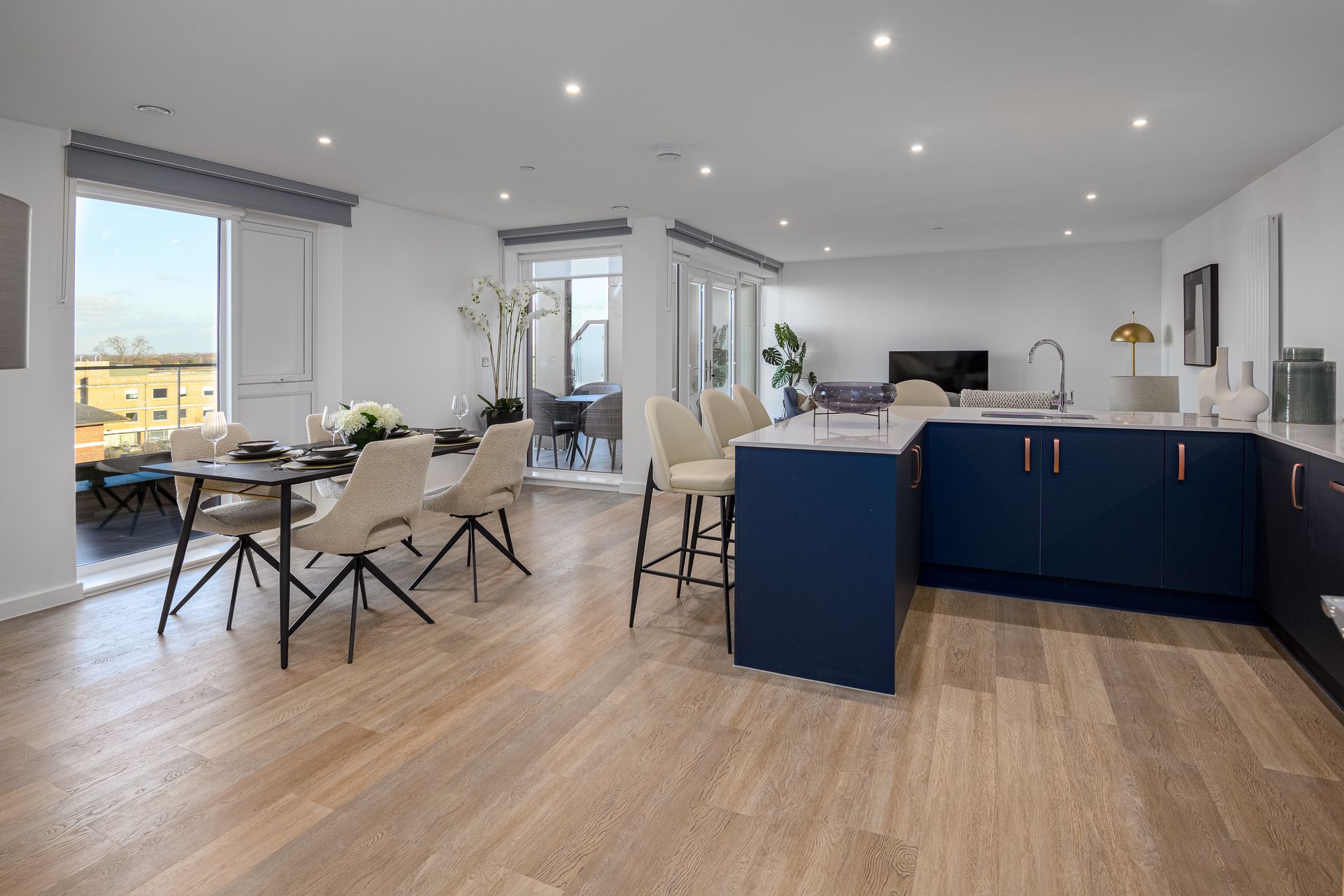 A kitchen and dining room in a house with a table and chairs at Walton Court.