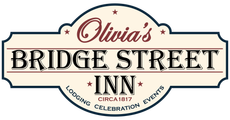 The logo for olivia 's bridge street inn has an eagle on it.