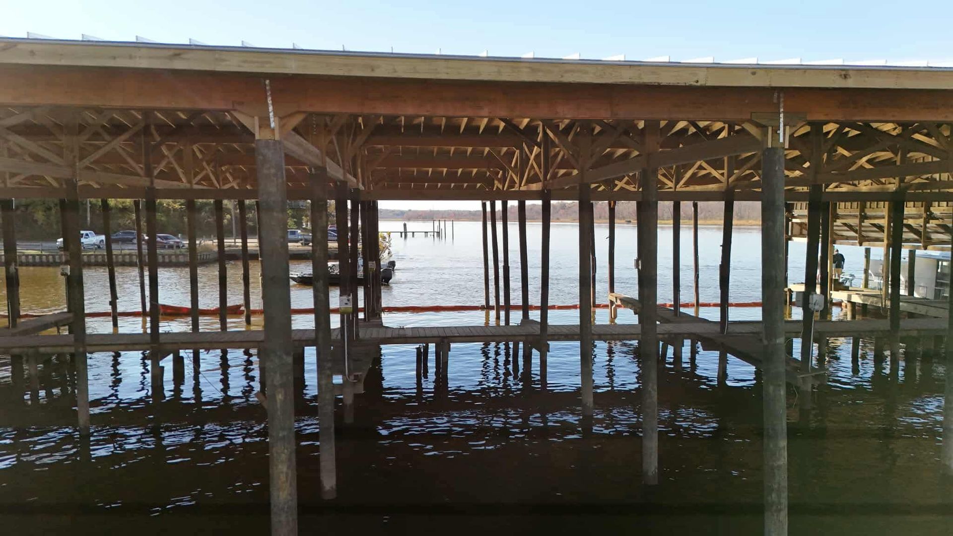 Structure of wooden supports over a body of water.