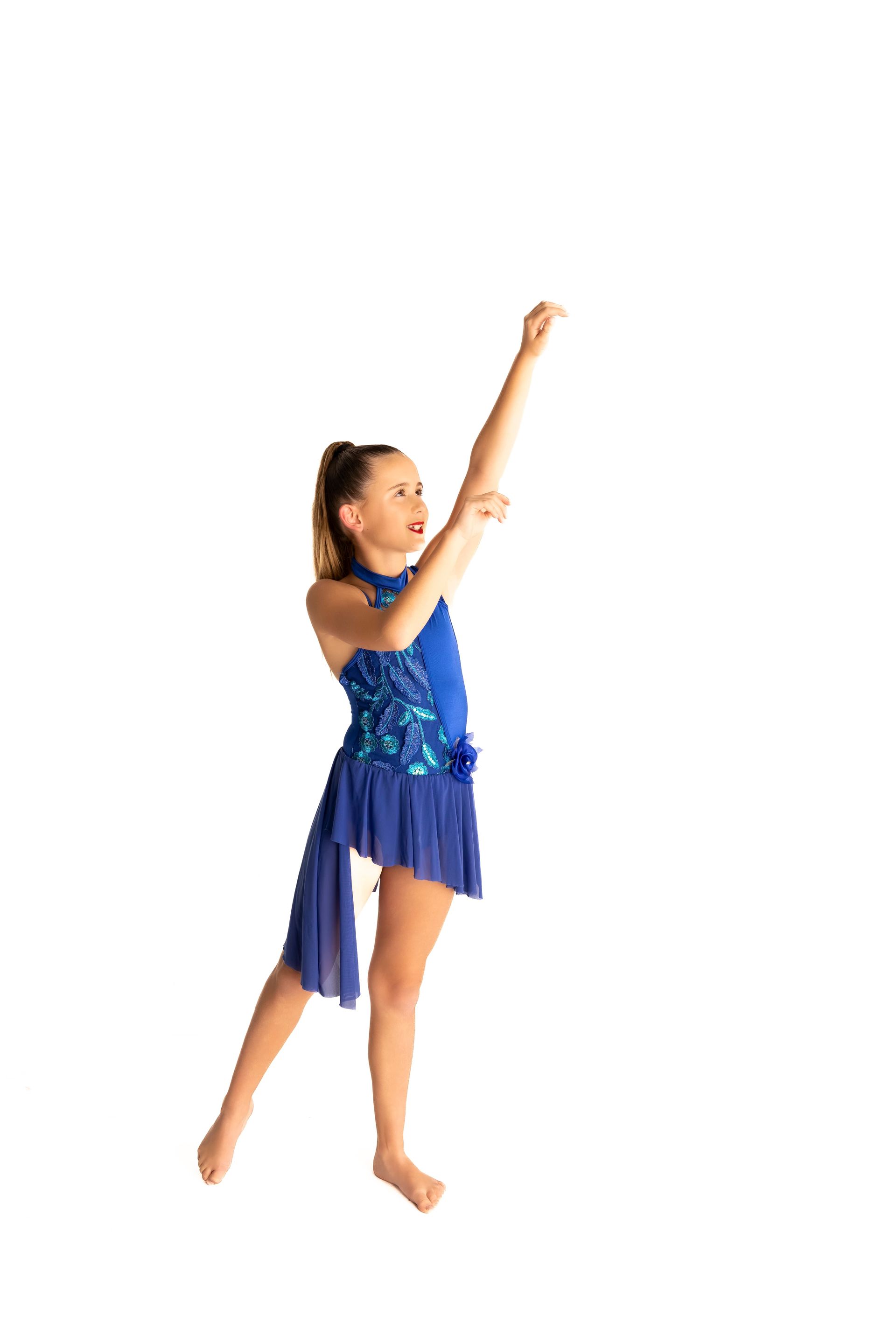 Girl in Blue Dance Costume, Arm Raised, Foot Pointed. Isolated on White Background — iDance Performance Co In Medowie, NSW