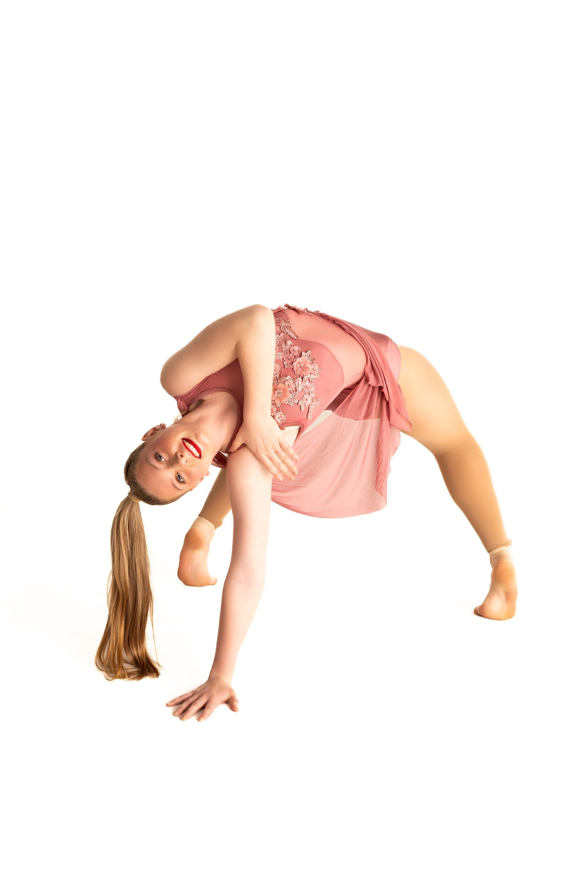 Dancer in a Pink Dress, Arched Backward, Arm Extended, Smiling — iDance Performance Co In Medowie, NSW