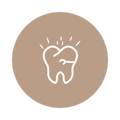 A line drawing of a tooth with a hole in it in a brown circle.