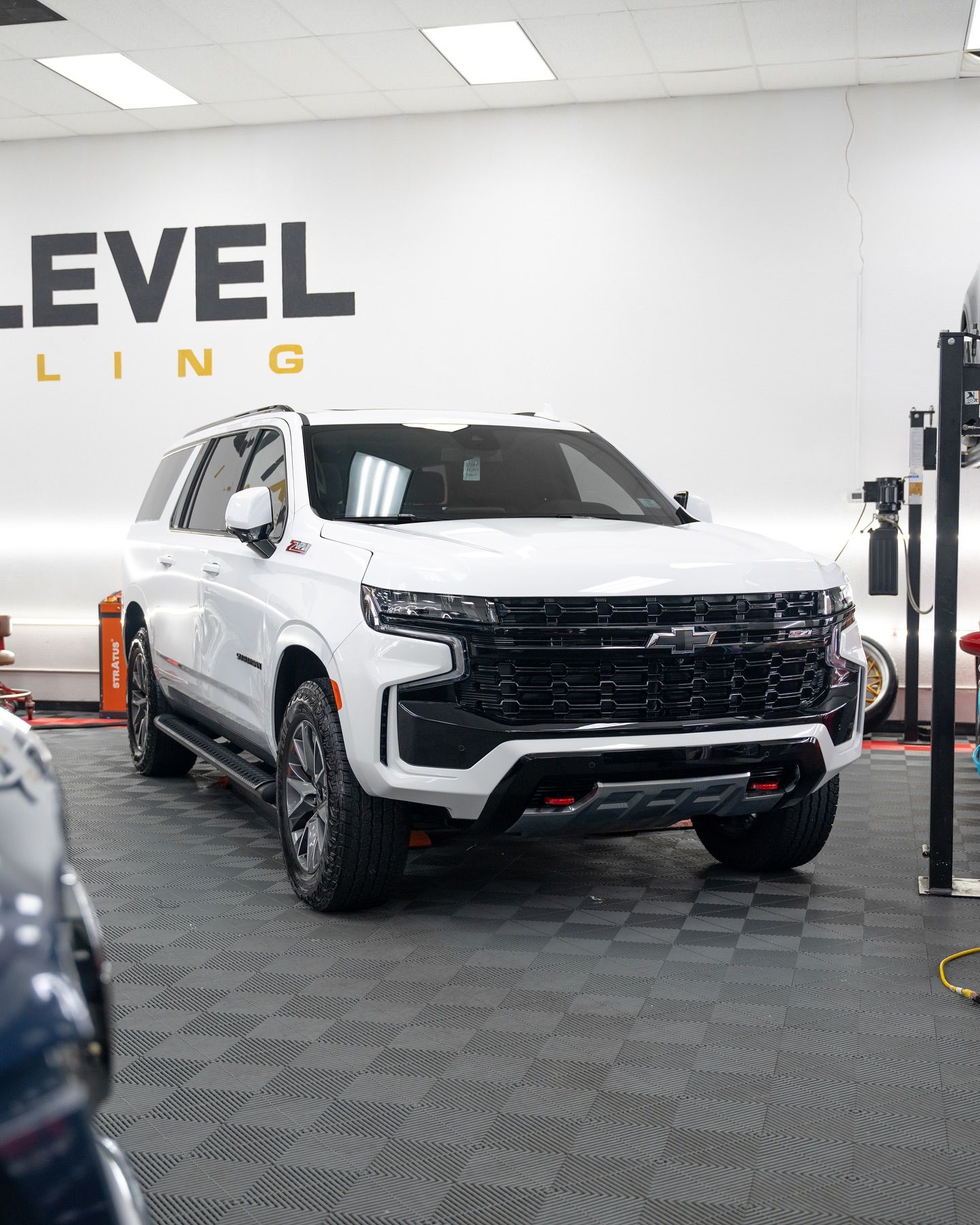 ceramic coated vehicle parked inside the shop
