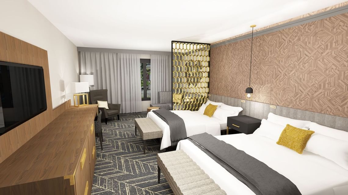 Hotel room with two beds, TV, desk, patterned wallpaper, and sheer curtains.