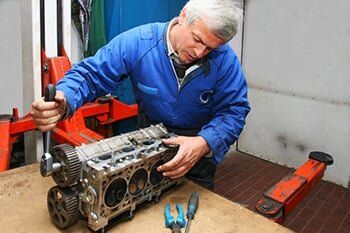 Mechanic is fixing engine problem