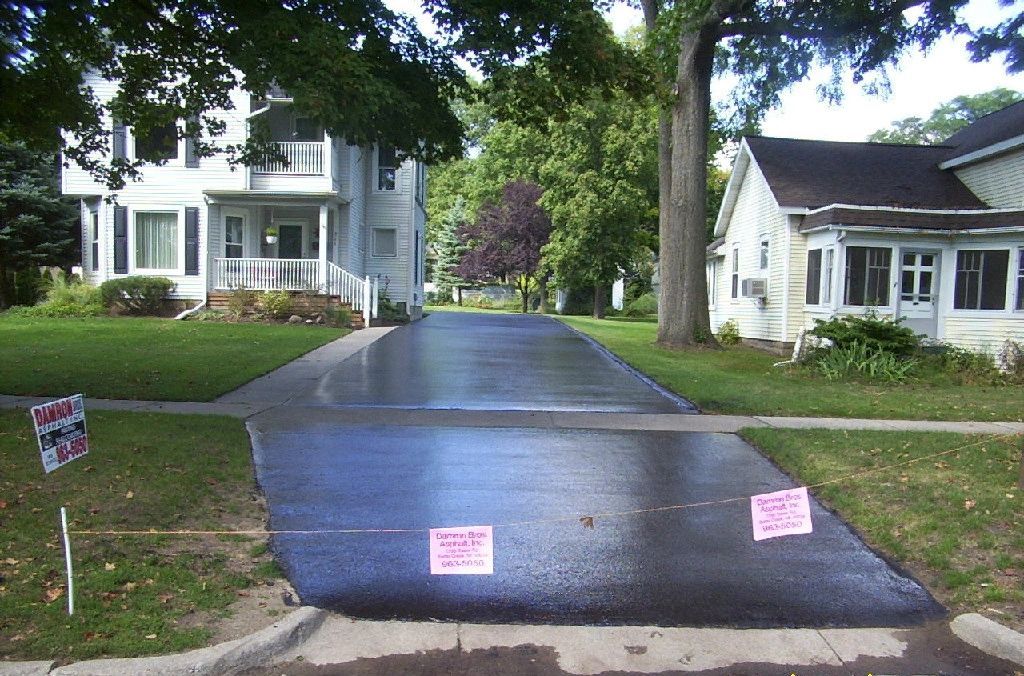 Seal Coating Asphalt Road — Battle Creek, MI — Damron Brother’s Asphalt