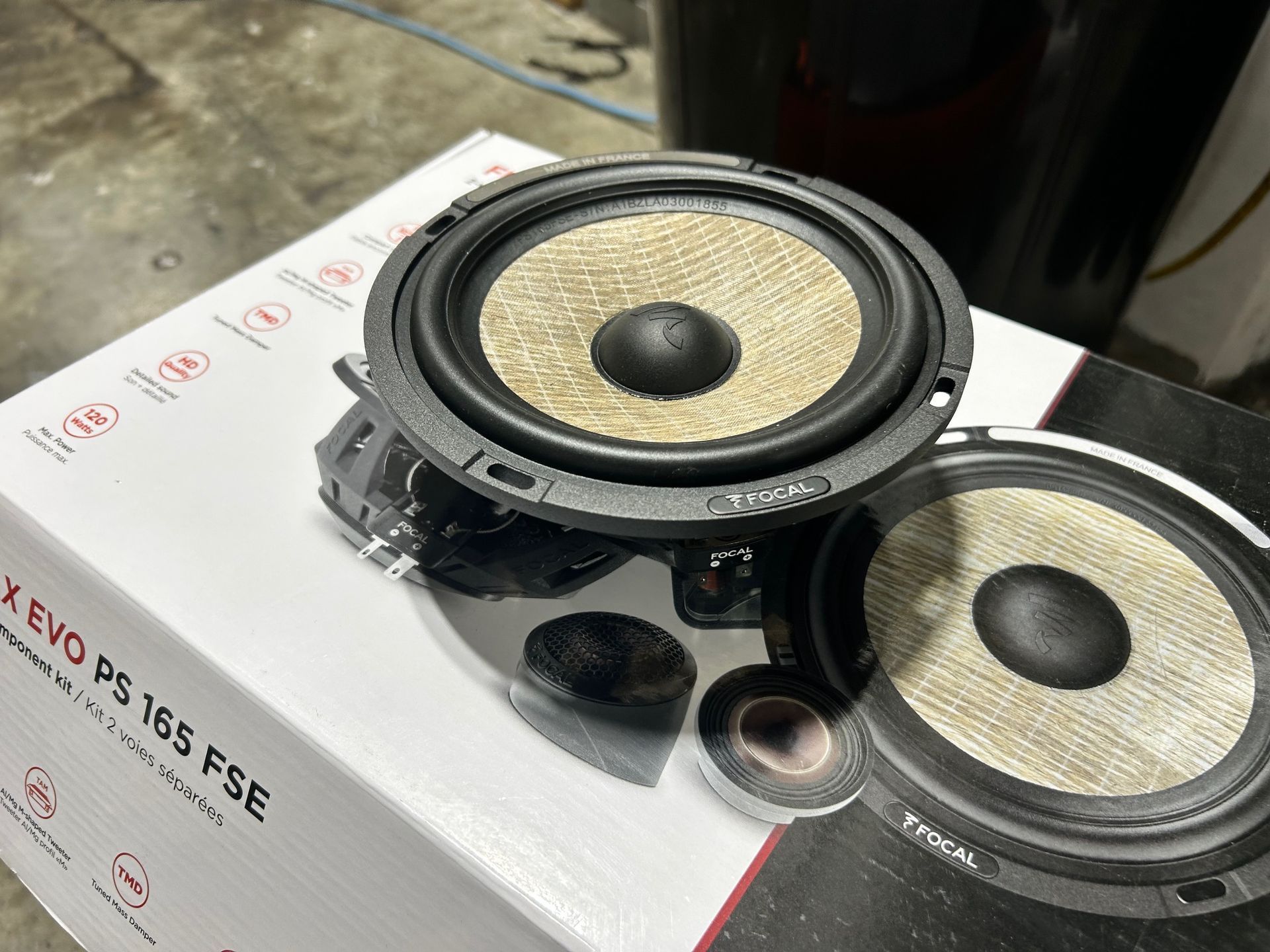A pair of speakers are sitting on top of a box.
