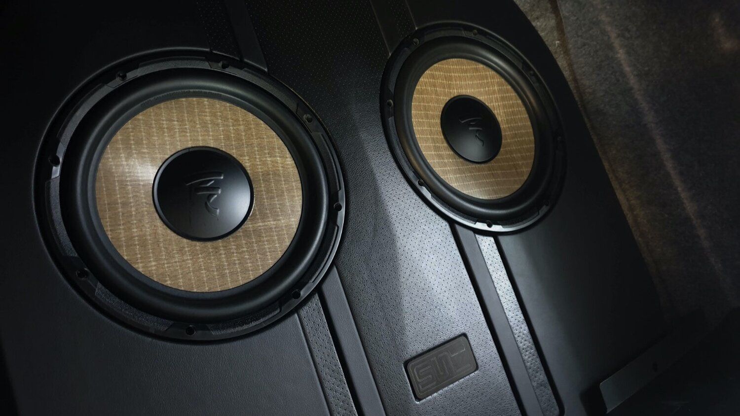 A person is pressing a button on a radio.