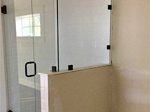 A bathroom with a bathtub, sink, toilet and shower