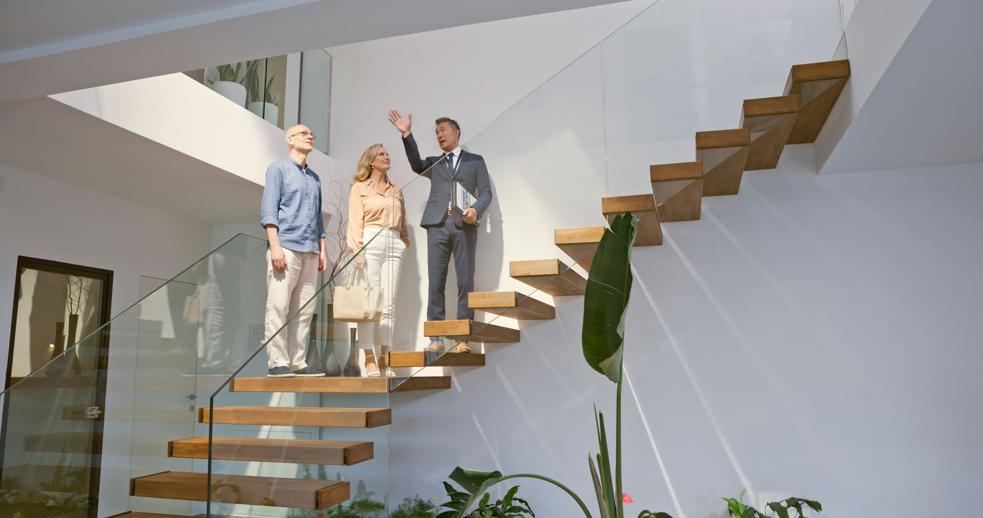 A bathroom with a tub, sink, toilet and shower