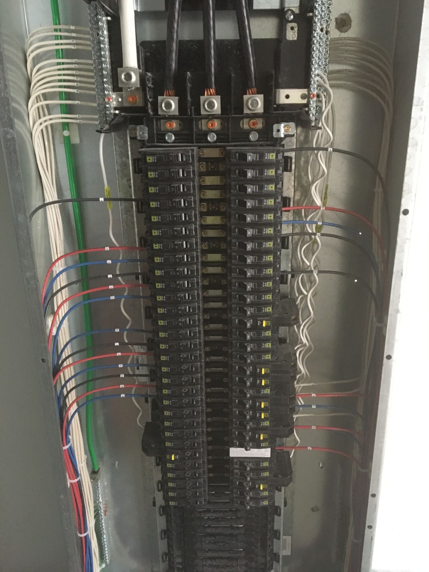 A bunch of wires are connected to a electrical box