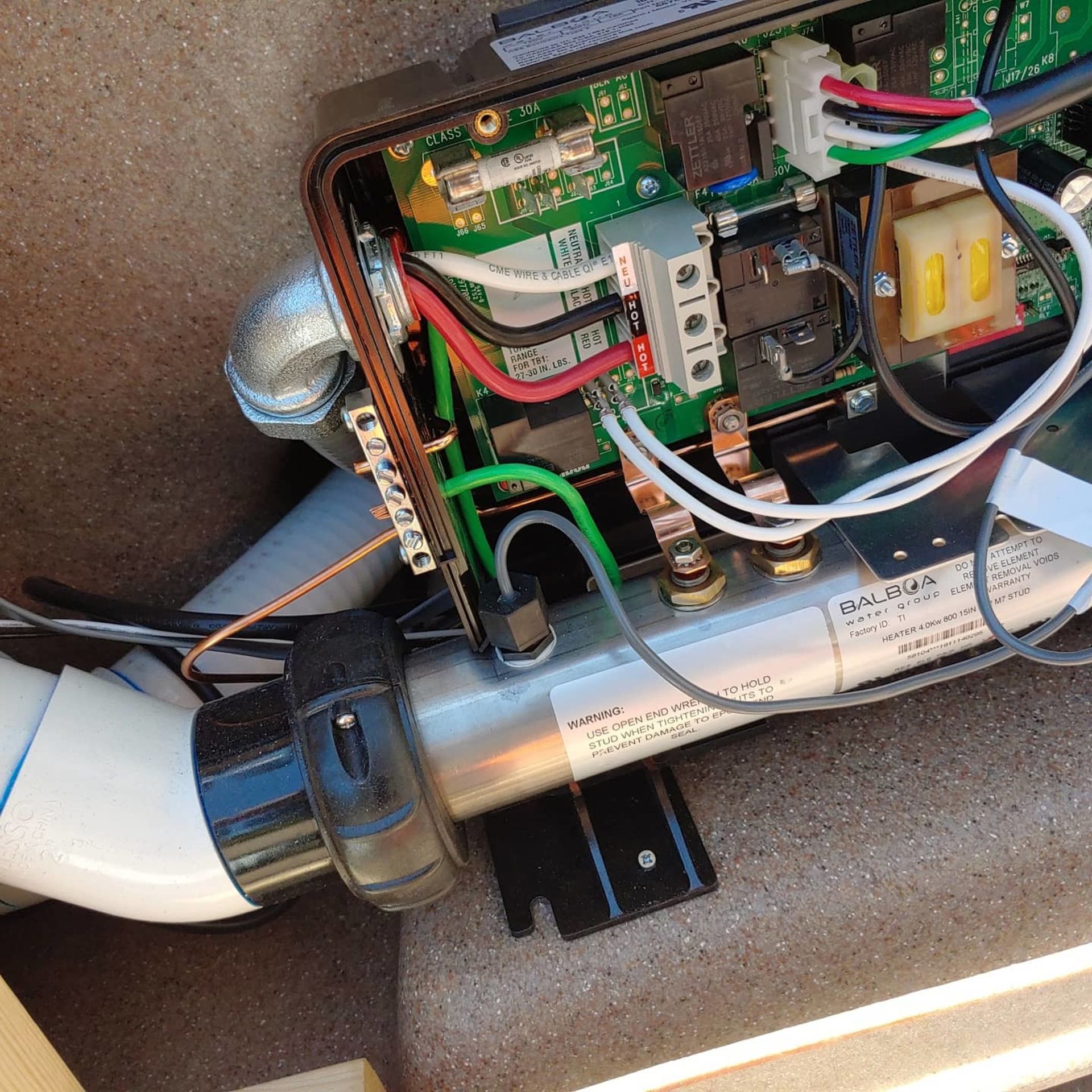 A device with a lot of wires coming out of it