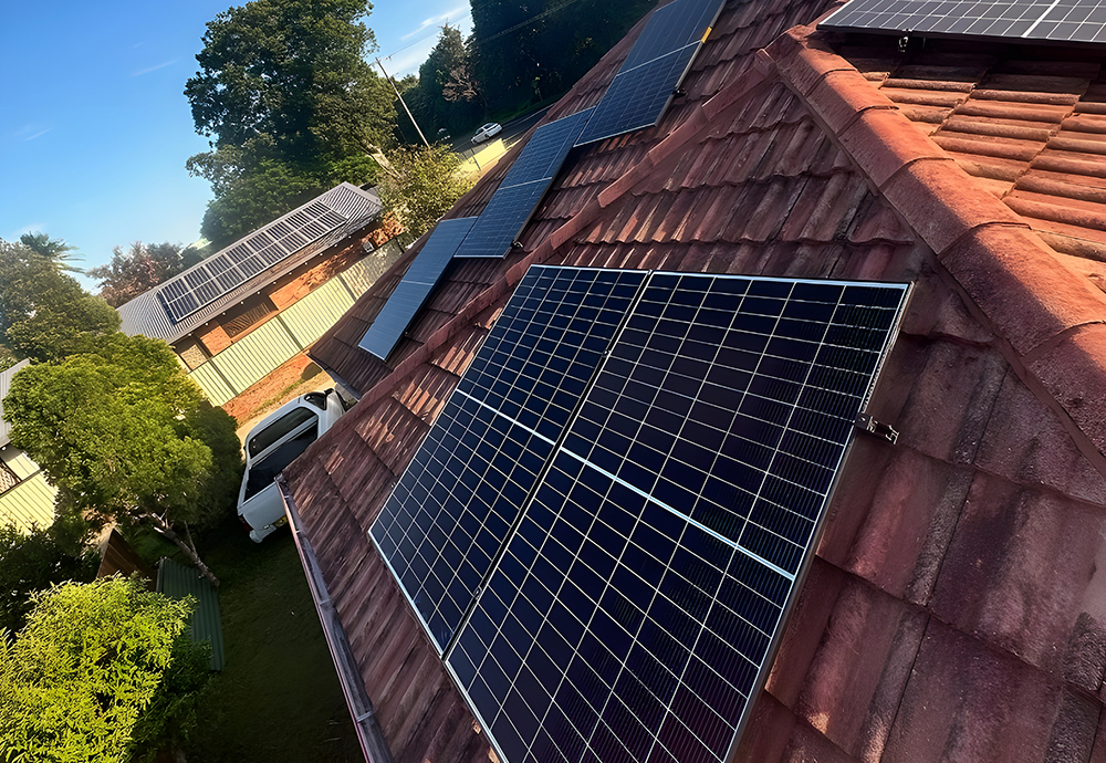 Solar Panels Installed on a Red-tiled Roof
