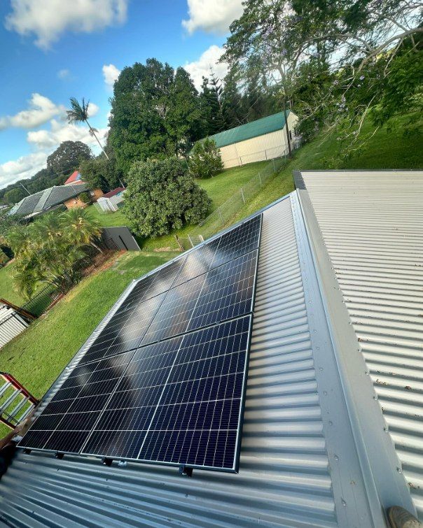 Solar Panels on a Corrugated Metal Roof — Grand Casa Electrical Solar & Batteries In Ballina, NSW