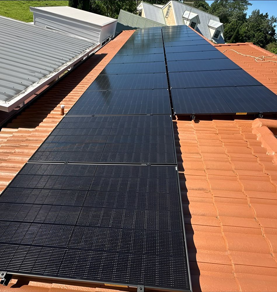 Solar Panels Installed On A Terracotta Tile Roof — Grand Casa Electrical Solar & Batteries In Lismore, NSW