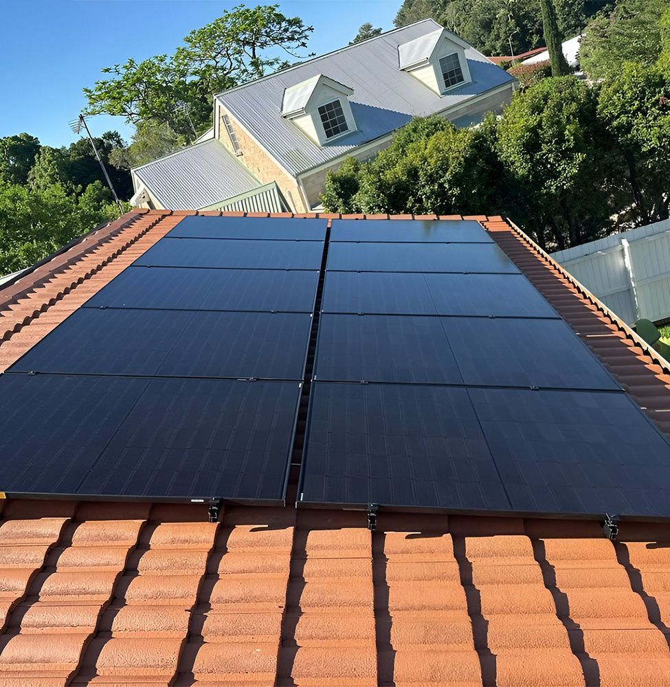 Solar Panels Installed on a Terracotta Tile Roof of a House — Grand Casa Electrical Solar & Batteries In Lismore, NSW