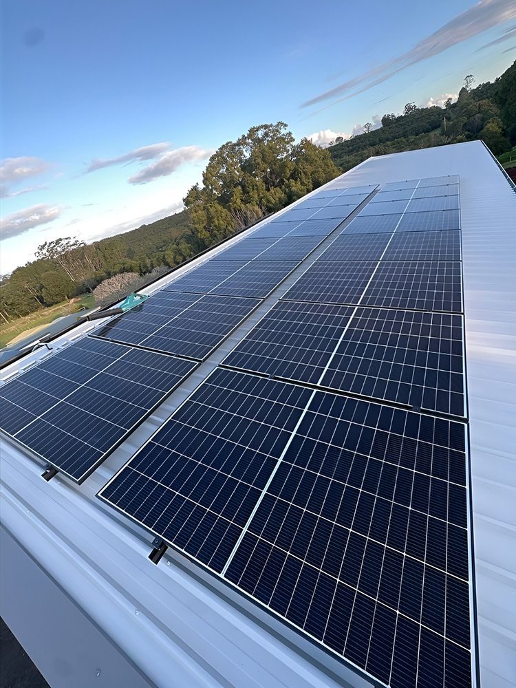 Solar Panels Installed on a White Metal Roof— Grand Casa Electrical Solar & Batteries In Lismore, NSW