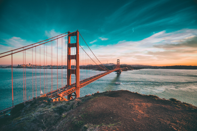 The golden gate bridge is a suspension bridge over a body of water.