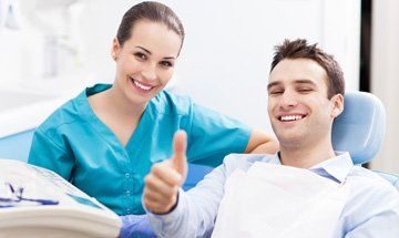 Dentist with Patient - Dental Services in Tucson, AZ