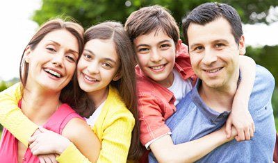 Happy Family with Smile - Dental Services in Tucson, AZ