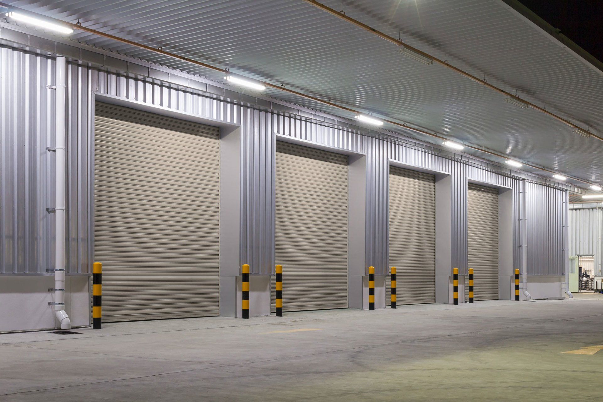 Roller Door and Concrete Floor — commercial garage door services Andover, MN