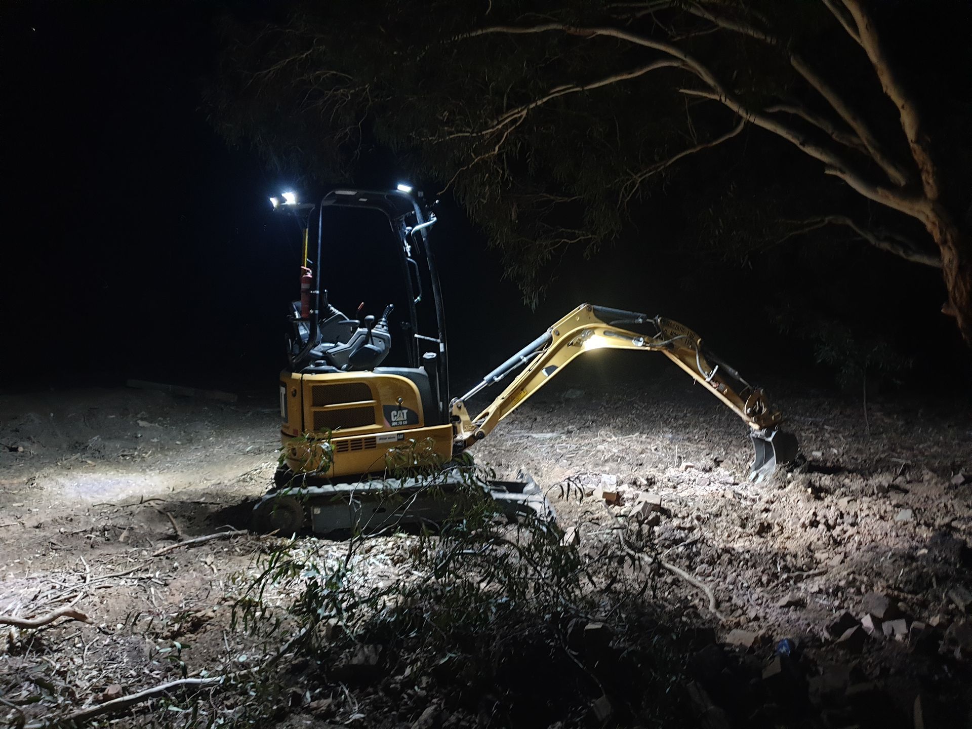 A person is pouring concrete on a concrete floor.
