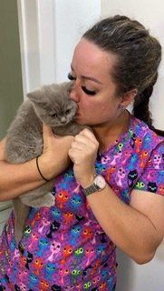 Vet Holding Small Dog